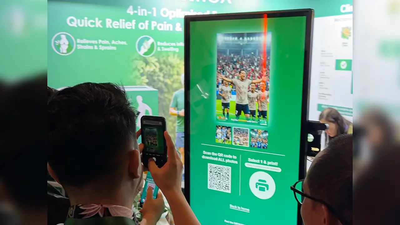 Guest taking a photo of an ARYA Nova football-themed AI result to share with others
