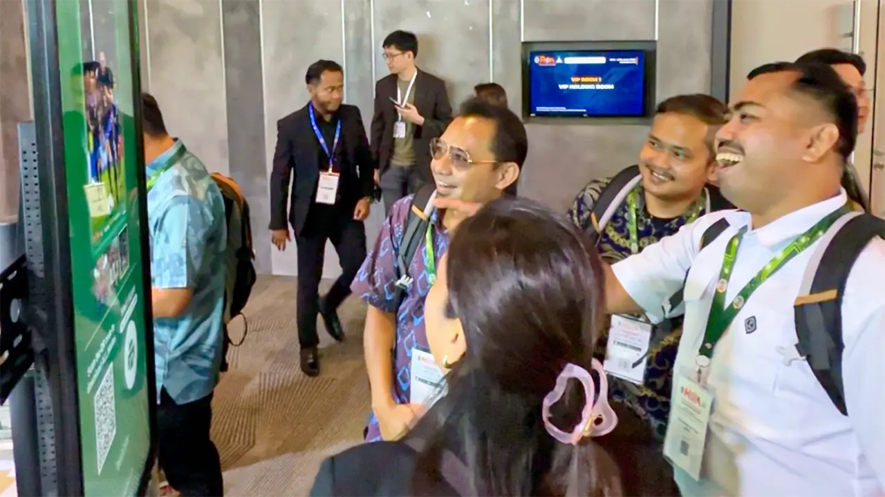 Guests reacting with excitement to their ARYA Nova football-themed AI results